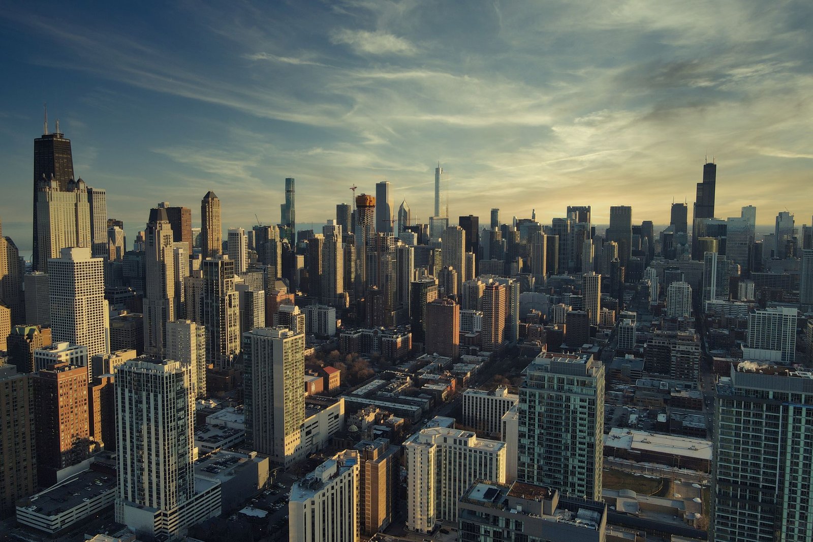 City skyline of high-rise towers at dusk