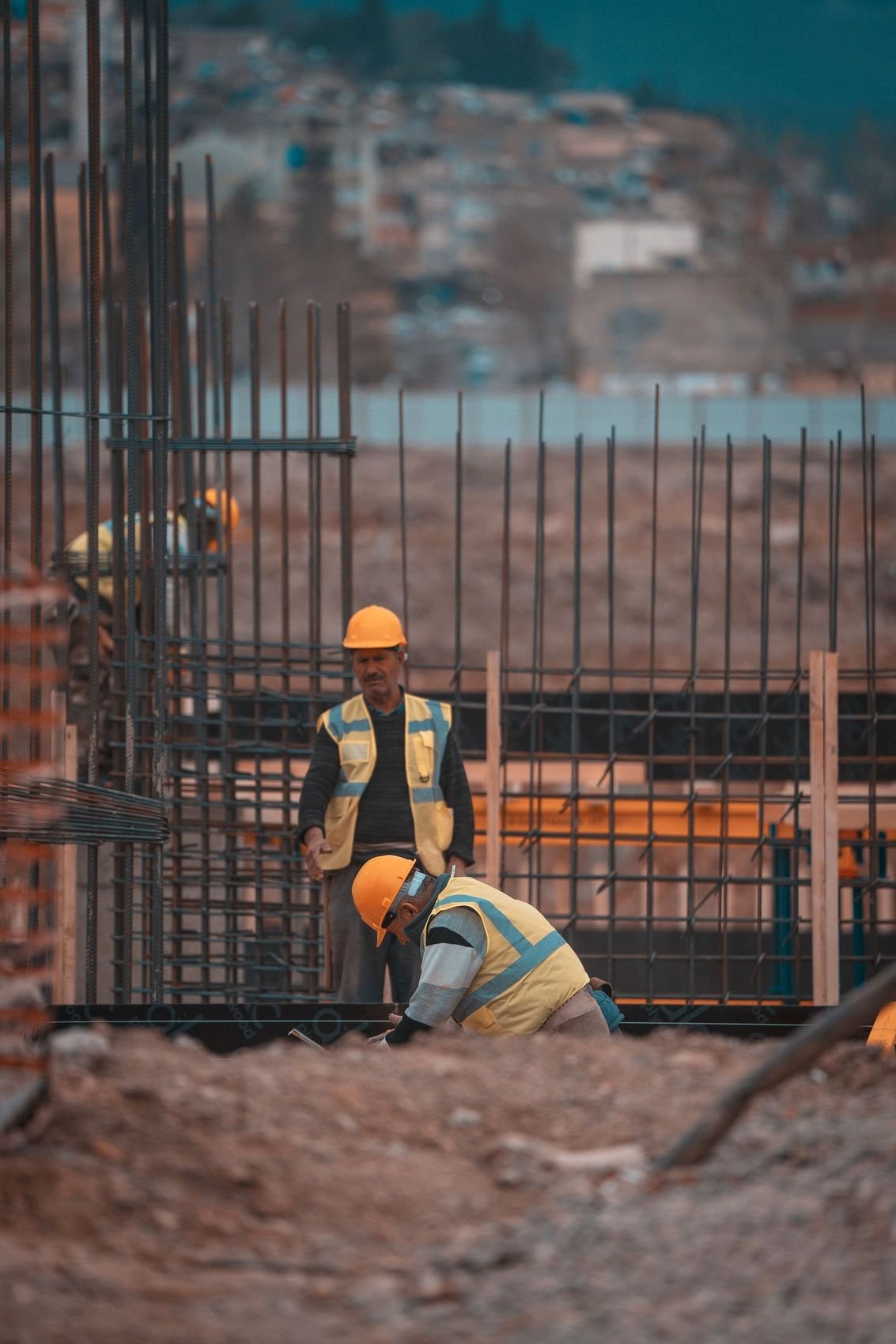 Construction crew fixing reinforcement steel on site