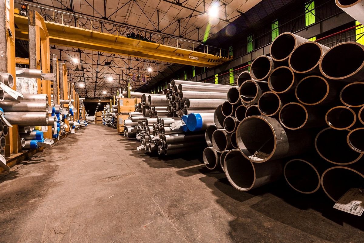 Steel pipe and tube stock racked in a supply warehouse